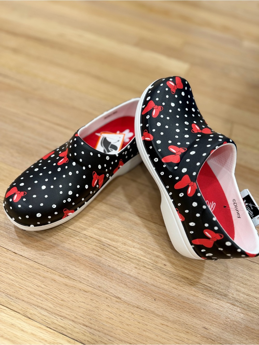 CROCS Black Polka Dot Slip-On Clogs with Red Bow Print